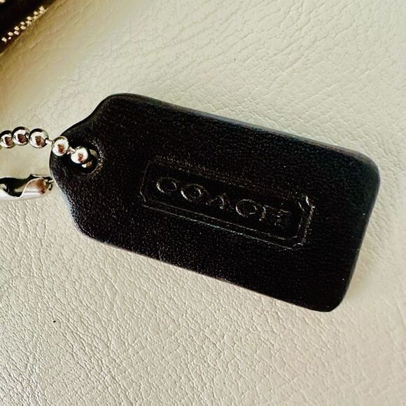 Coach Signature canvas wristlet with leather trim. - Picture 4 of 6